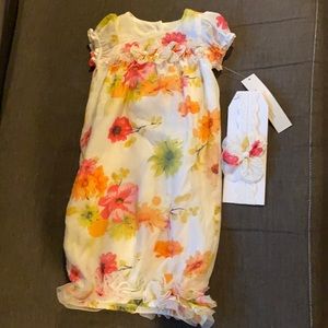 Never worn newborn dress and headband with tags.